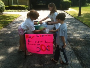EJ and Hannah selling lemonade to support Maddie's corner.