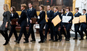 UNITED STATES - JANUARY 6: Senate pages lead the procession of the Senate through the U.S. Capitol Rotunda into the House chamber with the Electoral College ballot boxes on Friday, Jan. 6, 2017. (Photo By Bill Clark/CQ Roll Call)