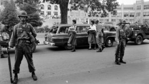 Paratroopers protect the Little Rock Nine from White Supremacists
